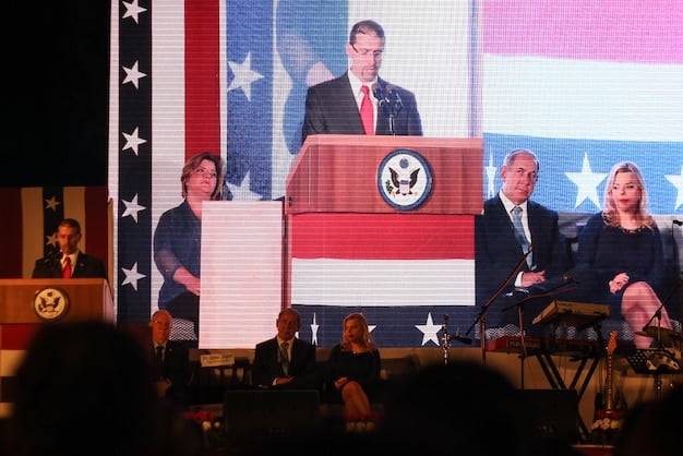 A Republican Party meeting with representatives from various factions - fiscal conservatives, social conservatives, and moderates - engaged in a discussion, set in a conference room with the Republican Party logo.