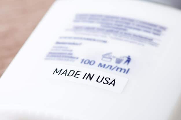 A close-up of a patent document with the US Patent and Trademark Office seal, symbolizing the official protection of intellectual property.